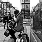 Photo: sidewalk cellist Clara Shandler